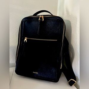 Chic Black Backpack
Zipper pockets.  LCalpak. Missing one zipper leather detail